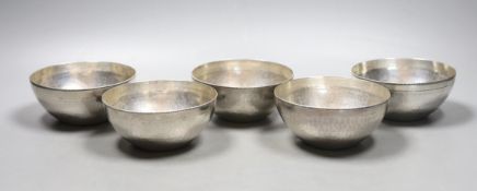 A set of five early to mid 20th century Egyptian planished white metal finger bowls, diameter 10.
