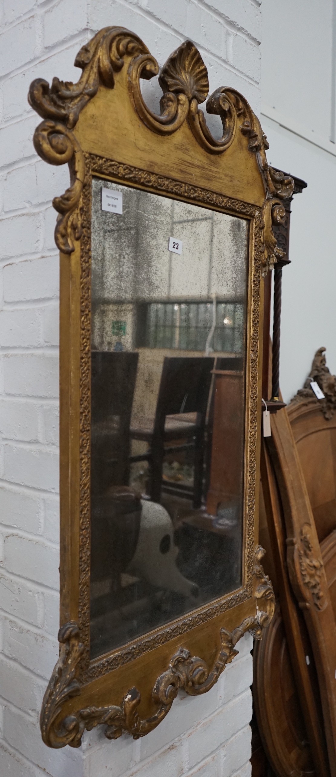 A 19th century carved giltwood wall mirror, width 61cm, height 110cm**CONDITION REPORT**PLEASE