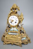 A 19th century French Sevres style porcelain and ormolu mantel clock - 35cm tall**CONDITION