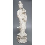 A tall Chinese blanc de chine figure of Guanyin -47cm high**CONDITION REPORT**PLEASE NOTE:-