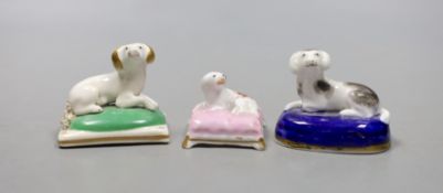 Two English porcelain models of recumbent king Charles spaniels, possibly Davenport, c.1830–50, 5.