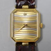 A lady's 18k gold electroplated Raymond Weil quartz wrist watch, with three colour dial, on a a