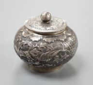 A Chinese white metal unsigned pot and cover,5cms high.**CONDITION REPORT**PLEASE NOTE:- Prospective