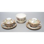 A Chinese porcelain tea bowl and stand and a pair of Cantonese bowls, covers and stands, 14cm