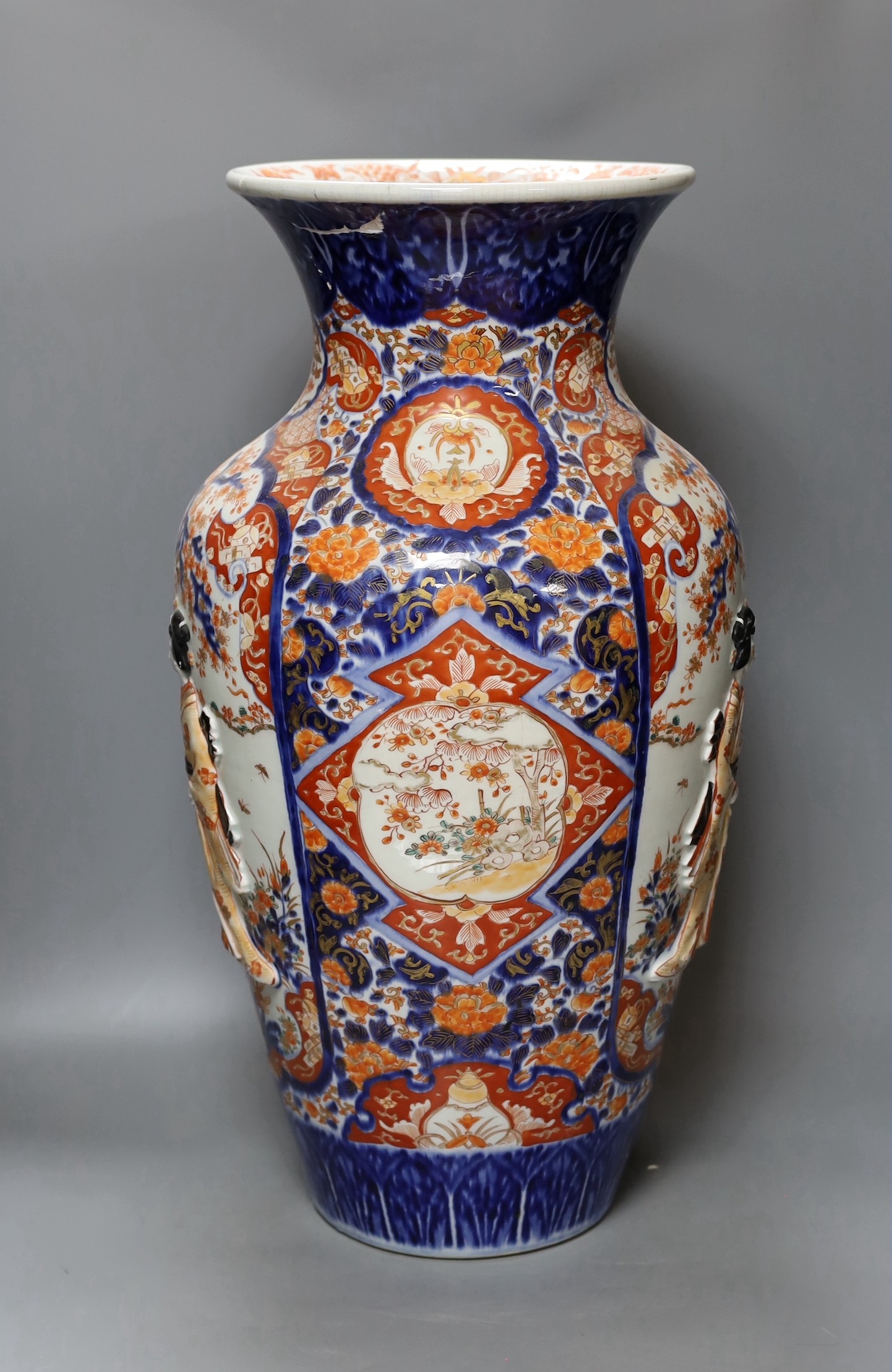 An unusual large Japanese Imari vase, Meiji period relief moulded with figures, 57cm tall, - Image 2 of 4