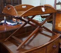 A Victorian mahogany folding butler’s tray, width 91cm, depth 63cm, height 41cm on later stand,**