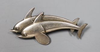 A Georg Jensen sterling twin dolphin brooch, no. 317, 40mm.**CONDITION REPORT**PLEASE NOTE:-