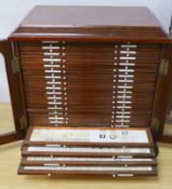 An Edwardian mahogany microscope slide collector's cabinet, eight trays containing insect,