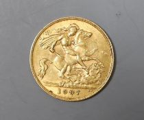 An Edward VII 1907 gold half sovereign.**CONDITION REPORT**PLEASE NOTE:- Prospective buyers are