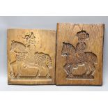 Two elm wooden wall carvings/moulds of men on horseback, one carved to reverse (2)**CONDITION