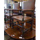 A pair of 1920's Carolean style walnut elbow chairs, width 62cm, depth 47cm, height 100cm**CONDITION