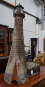 A vintage brick effect wood model lighthouse, wired for electricity height 110cm**CONDITION