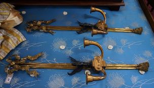 A pair of bronzed and gilt metal Empire style twin branch ribbon fold wall lights, height 95cm**