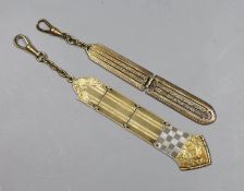 Two early 20th century Austro-Hungarian yellow metal chatelaine attachments?, approx. 85mm, one with