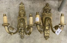 A pair of brass twin branch ormolu wall lights, height 42cm**CONDITION REPORT**PLEASE NOTE:-