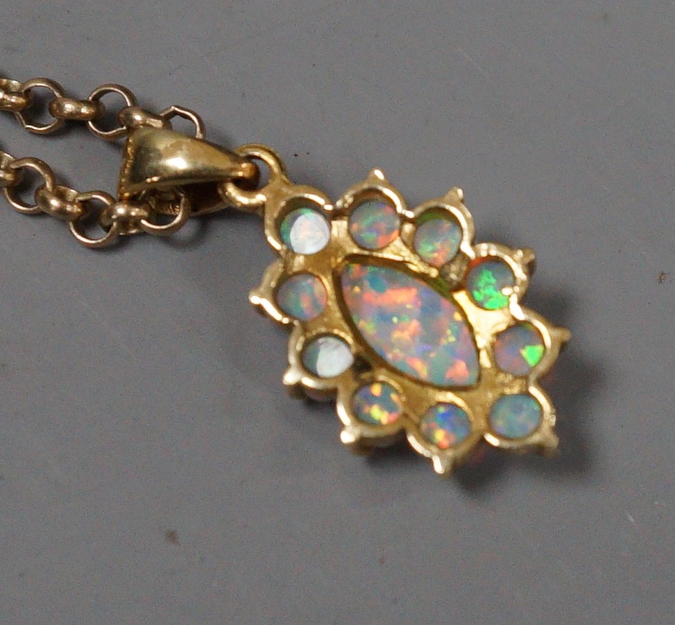 A modern 585 yellow metal and opal set oval cluster pendant, 18mm, on a 9k chain, 50cm, gross weight - Image 2 of 2