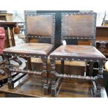 A set of six Carolean style oak and studded leather dining chairs**CONDITION REPORT**PLEASE NOTE:-