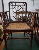 An Edwardian mahogany "Cockpen" cane seat elbow chair, width 68cm, depth 48cm, height 96cm.**