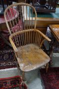 A 19th century ash and elm Windsor comb back armchair, width 54cm, depth 50cm, height 105cm**