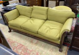An early 20th century mahogany three-seater settee on claw feet, length 220cm, depth 86cm, height