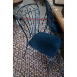 A set of four painted wrought iron dining chairs**CONDITION REPORT**PLEASE NOTE:- Prospective buyers