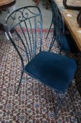 A set of four painted wrought iron dining chairs**CONDITION REPORT**PLEASE NOTE:- Prospective buyers