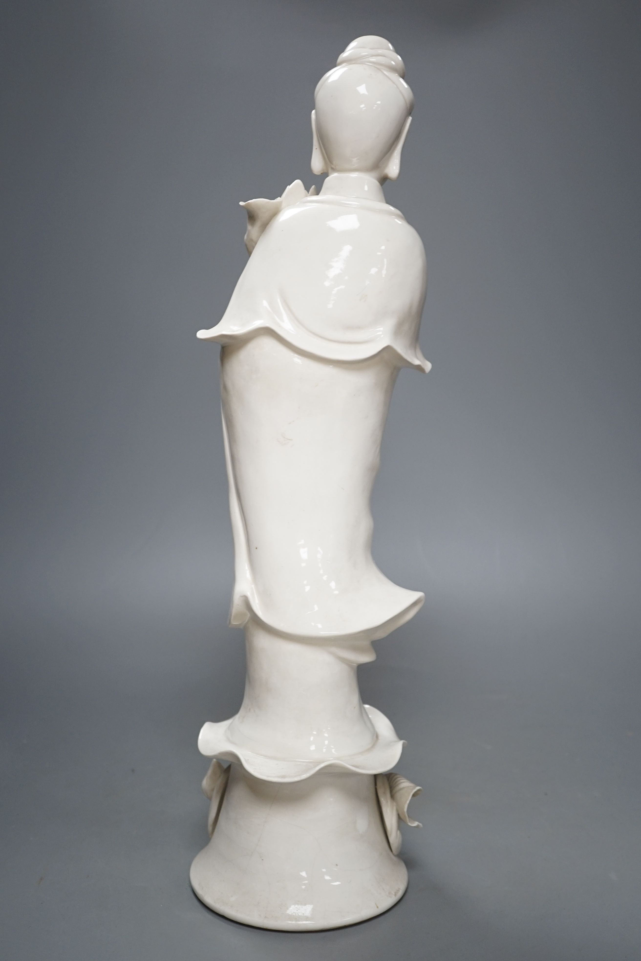 A tall Chinese blanc de chine figure of Guanyin -47cm high**CONDITION REPORT**PLEASE NOTE:- - Image 3 of 5