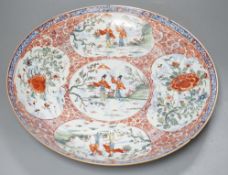 A large Chinese Kangxi dish, clobbered decoration,37 cms diameter.**CONDITION REPORT**PLEASE