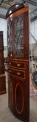 A large Regency mahogany bowfront standing corner cabinet, width 88cm, depth 47cm, height 246cm**