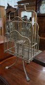 An Edwardian gilt metal wirework four division magazine rack**CONDITION REPORT**PLEASE NOTE:-
