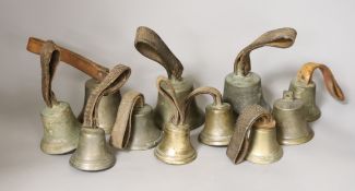 A harlequin set of 11 musical hand bells