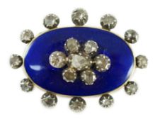 A 19th century gold, blue enamel and rose cut diamond set oval brooch, set with nineteen stones,
