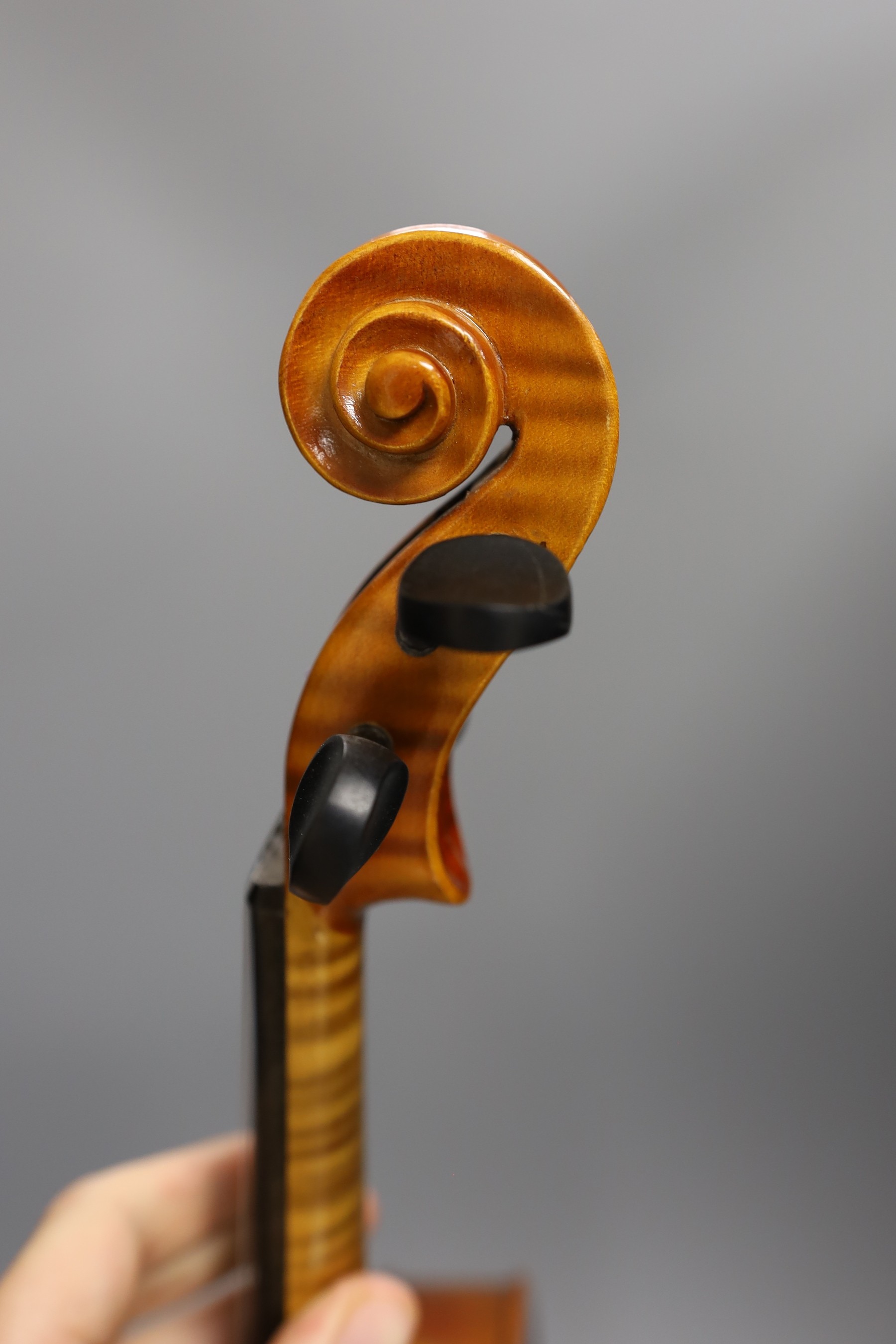 A cased child's violin and bow with ivorine tip, violin 55cms long, - Image 8 of 10
