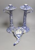 A pair of Wood & Sons tall blue and white candlesticks and a Delft blue and white cornucopia wall