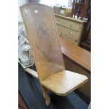 An African chip carved hardwood seat, height 90cm