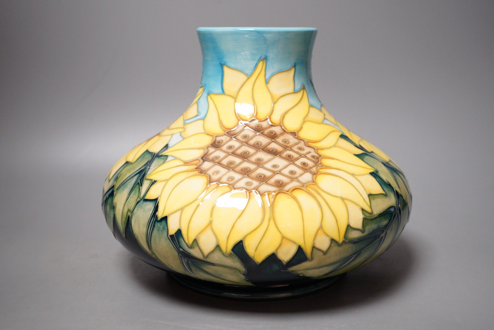 A Moorcroft pottery vase of compressed form, decorated in the "Sunflower" pattern, 20cm - Image 3 of 6