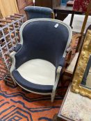 A painted French style upholstered tub frame armchair, (lacks seat cushion) width 70cm, depth