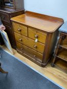 A small Victorian satinwood and mahogany chest of two short and two long drawers, width 89cm,