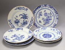 Seven 18th century Chinese export blue and white plates