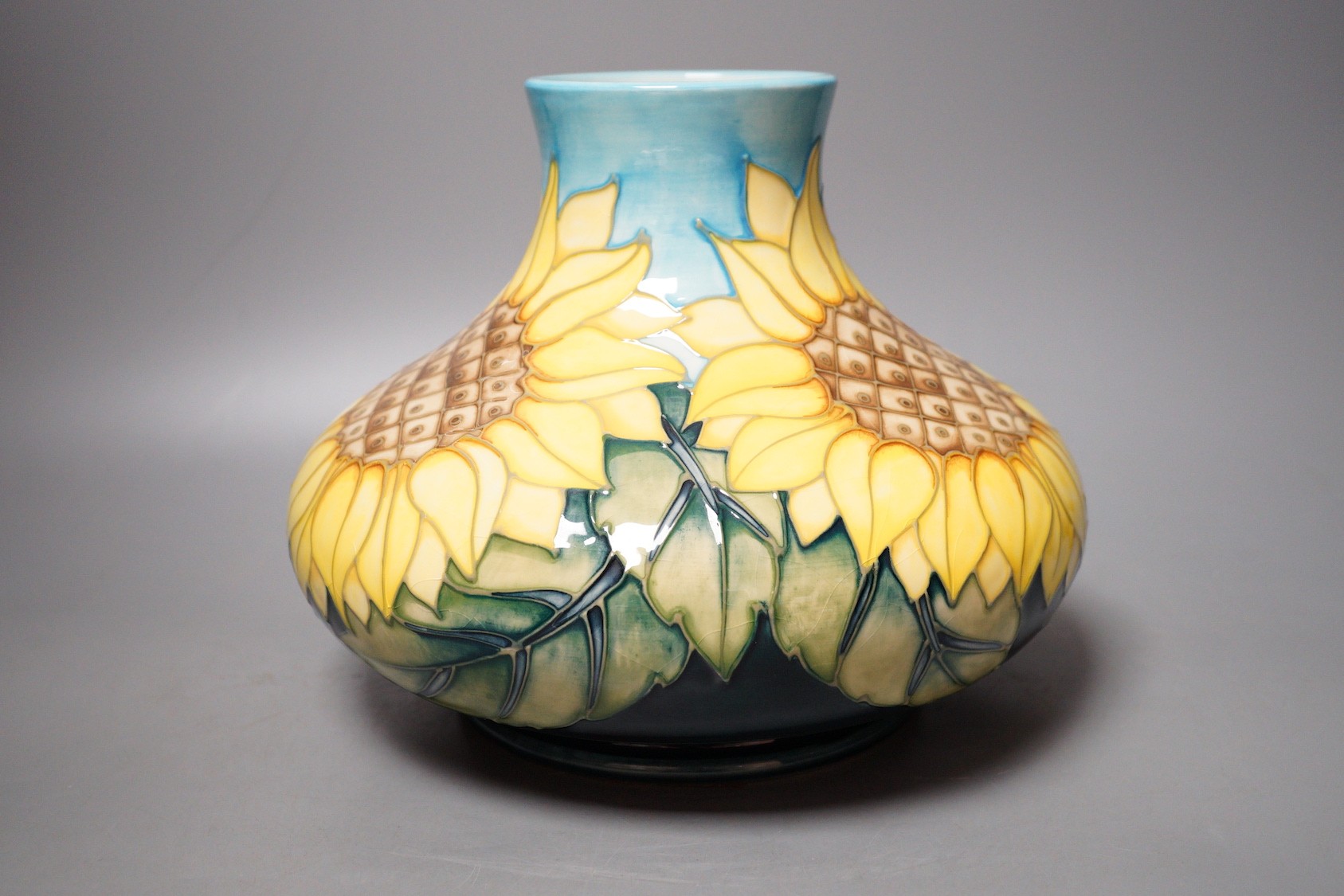 A Moorcroft pottery vase of compressed form, decorated in the "Sunflower" pattern, 20cm - Image 2 of 6