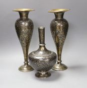 A pair of Indian damascened brass vases and a similar vase,pair of vases 33cms high,