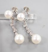 A modern pair of Maxim 14k white metal two stone cultured pearl and six stone diamond chip set