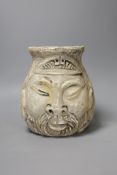 A carved alabaster twin face vase, signed,18 cms high,
