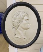 A large 'Claudius' simulated oval marble plaque, 69cm tall