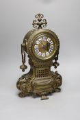 A late 19th century French brass cased mantel clock,41 cms high,