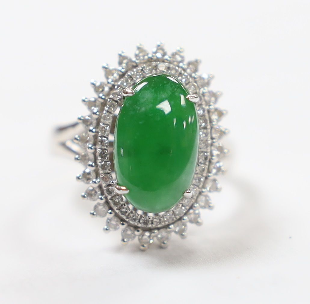 A modern 18k white metal, cabochon jade and two row diamond chip set oval cluster ring size L, gross - Image 2 of 8