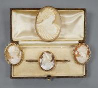 Two modern 9ct gold mounted oval cameo shell brooches, largest 30mm, a 9ct and oval cameo shell