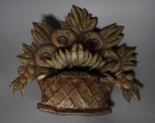 A painted embossed iron flower basket ornament
