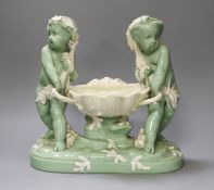 A Minton glazed celadon tinted parian centrepiece, mid 19th century, after Carrier-Belleuse,26cms