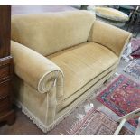 An early 20th century drop arm Chesterfield settee upholstered in gold dralon, operating handle with